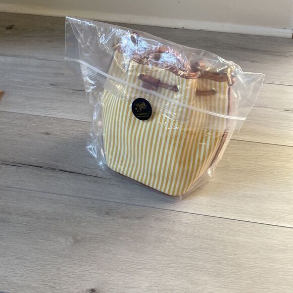 Dooney & Bourke Sullivan Coated Cotton Small Drawstring Crossbody yellow white - Picture 2 of 8